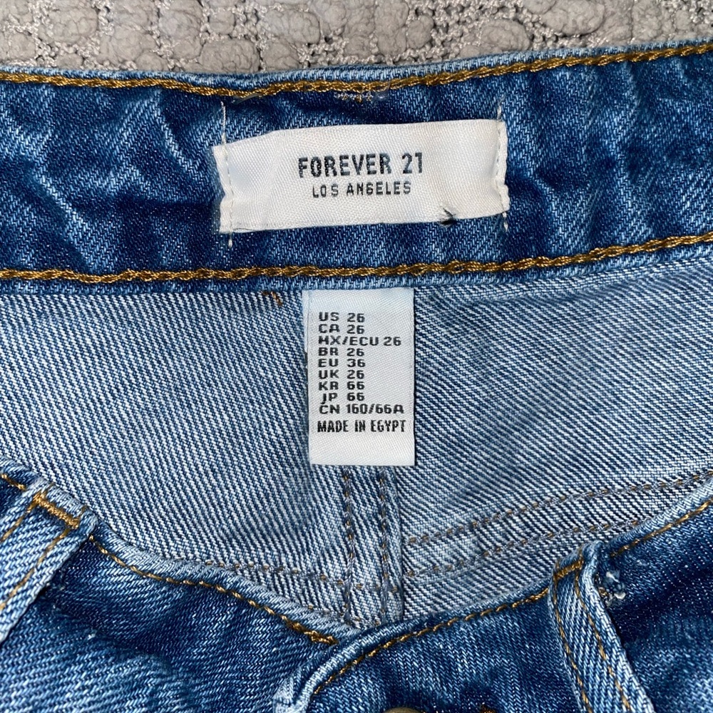 Distressed denim shorts - Picture 2 of 3